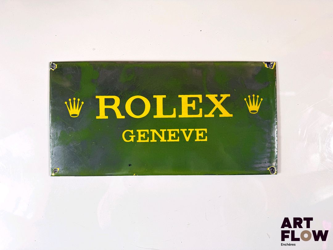 Plaque émaillée Rolex concessionnaire Dimensions : 30,5 x 15 cm - Expédition obligatoire.