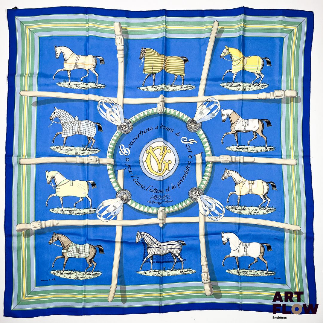 HERMÈS Paris Modèle "Couvertures et tenues de jour... Pour l'écurie, l'attente et la présentation" Carré en twill de soie dessiné par Jacques EUDEL. 90 x 90 cm Petit accroc et petites tâches.