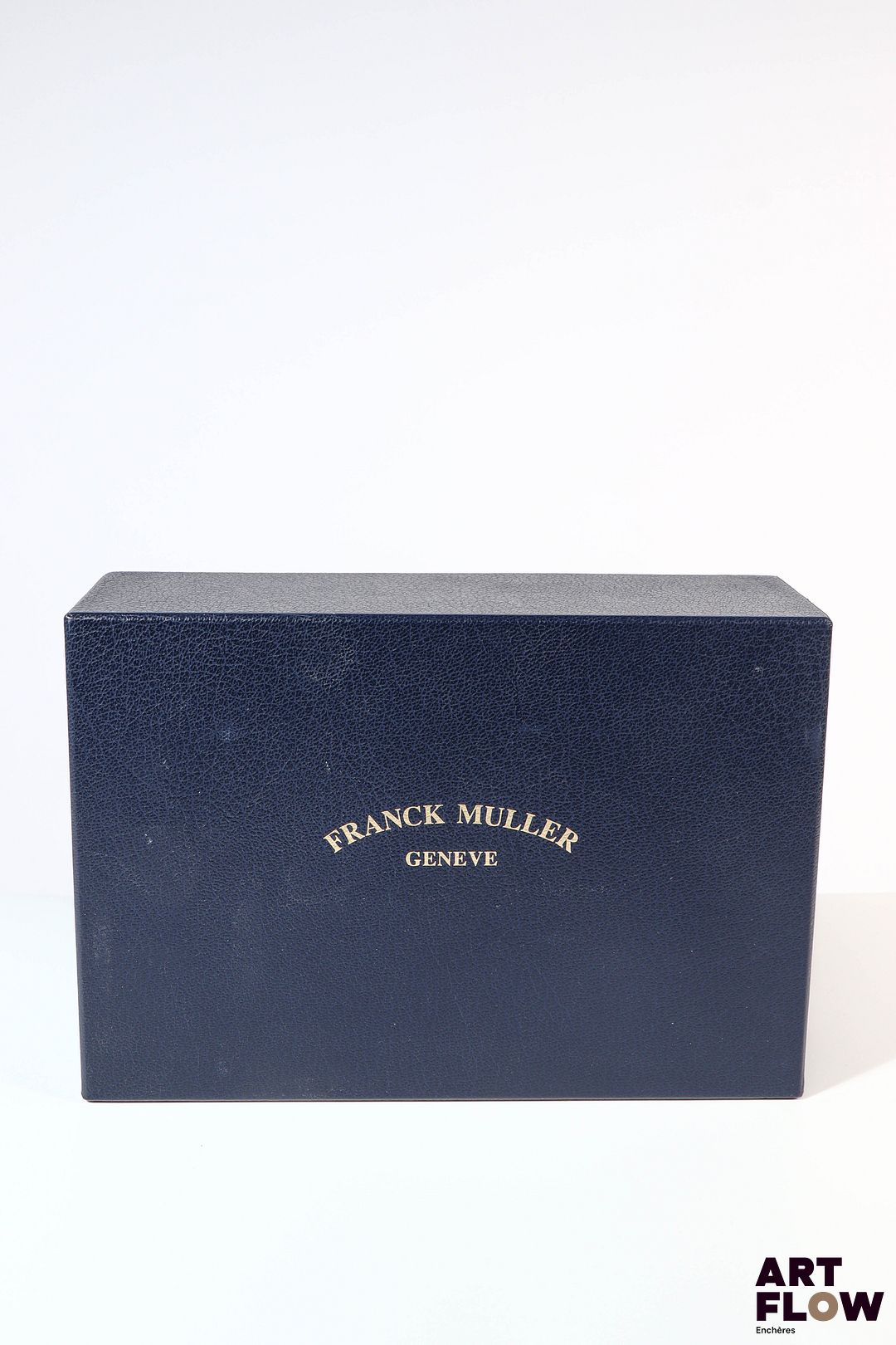 FRANCK MULLER Boite en bois fruitier et cuir et une sur boite 17,5 x 25 x 9 cm Traces d'humidité à l'intérieur, bon état général