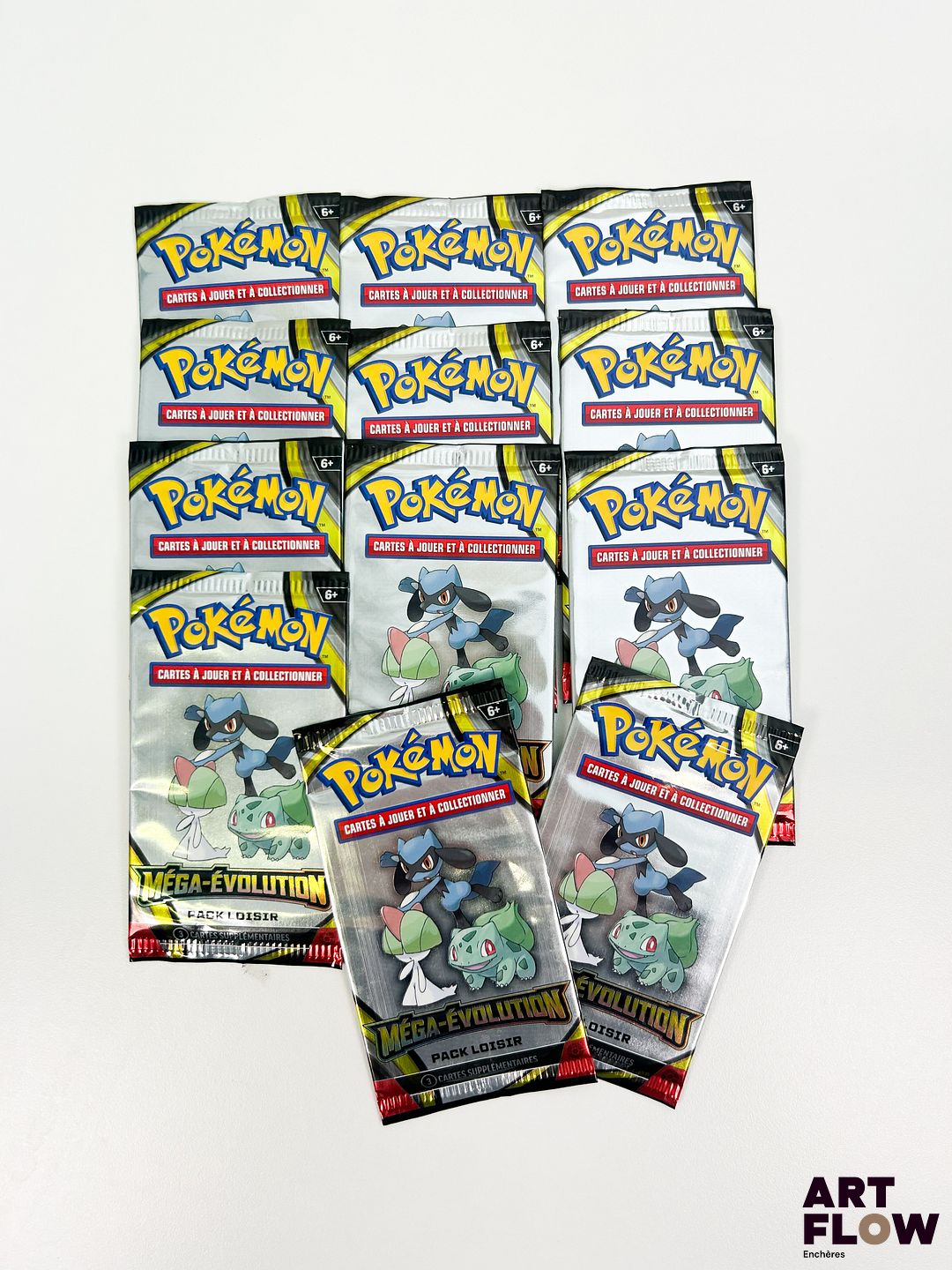 Ensemble de 12 boosters pack loisir Pokémon scellés Série du bloc Mega évolution (ME01). En français.