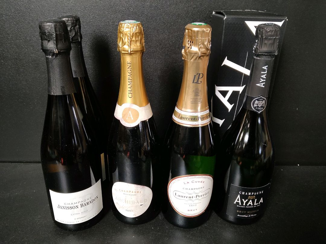 6 Bouteilles de Champagne dont: 2 Janisson Baradon extra brut, 2 Ayala Brut majeur, Archibald brut, Laurent Perrier La cuvée brut