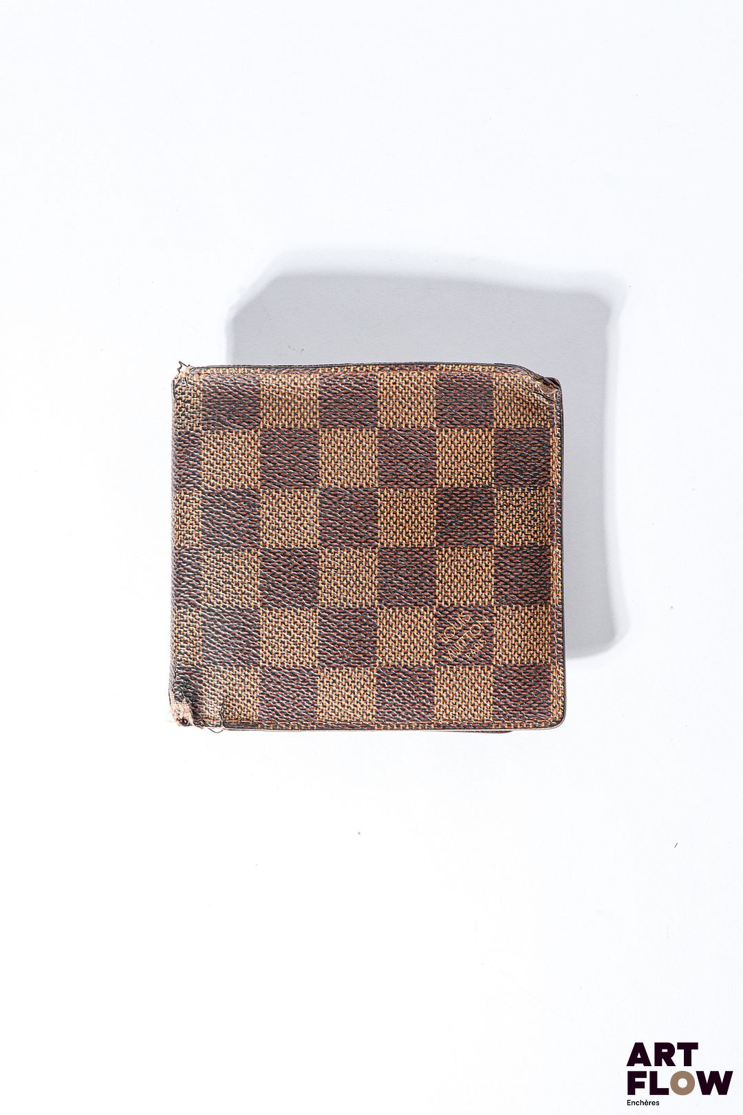 LOUIS VUITTON Portefeuille en toile enduite monogrammée Dimensions : 10 x 11 cm Usures