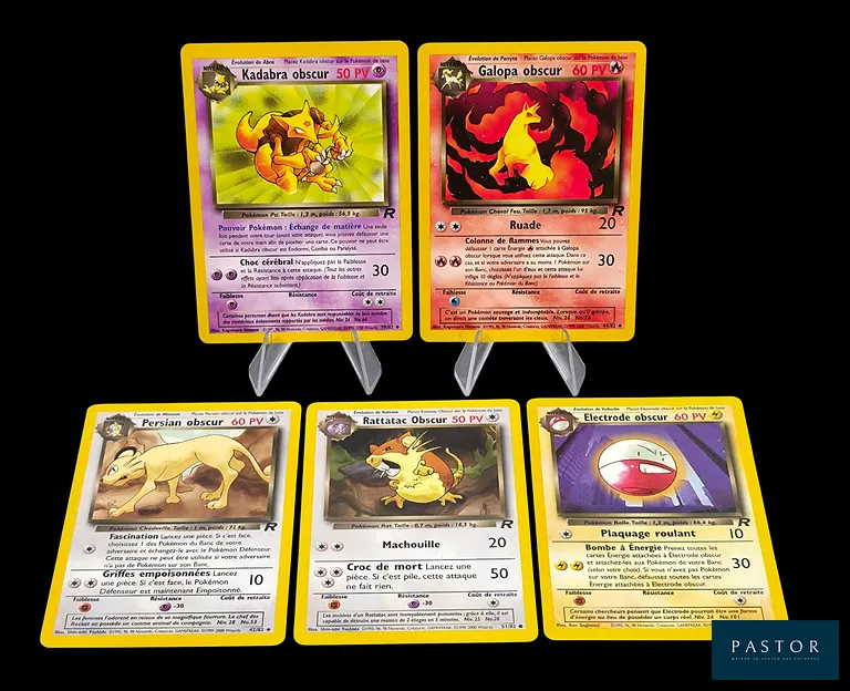 Réunion de 5 cartes Pokémon Obscurs. 
Communes et Peu communes. 
Série du bloc Wizards : Team rocket
Cartes en état global Excellent /Near Mint, en français.