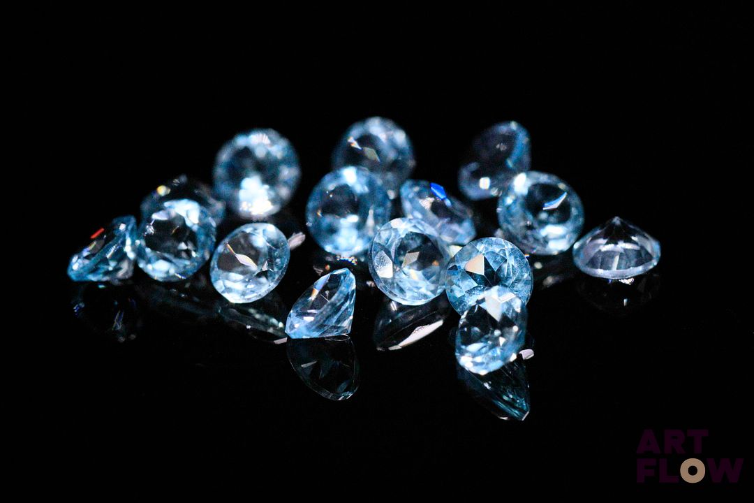 Quinze topazes rondes. 9.64 cts. Diam. moy.: 5.0mm