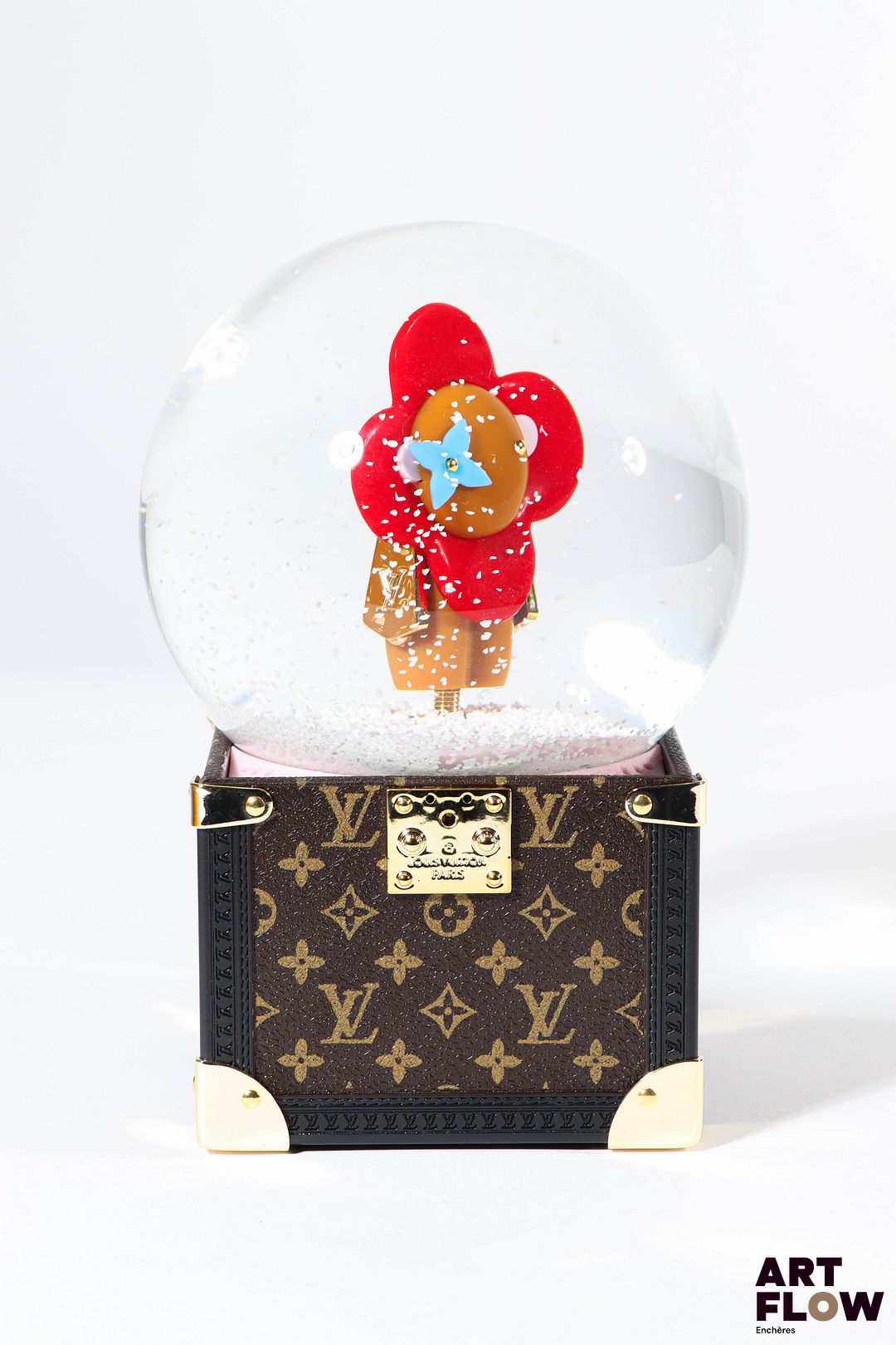 LOUIS VUITTON Modèle Vivienne Boule à neige faisant office de boîte à musique. Edition limitée offerte aux clients VIP. Fonctionnelle. Dans sa boîte d’origine Etat comme neuf