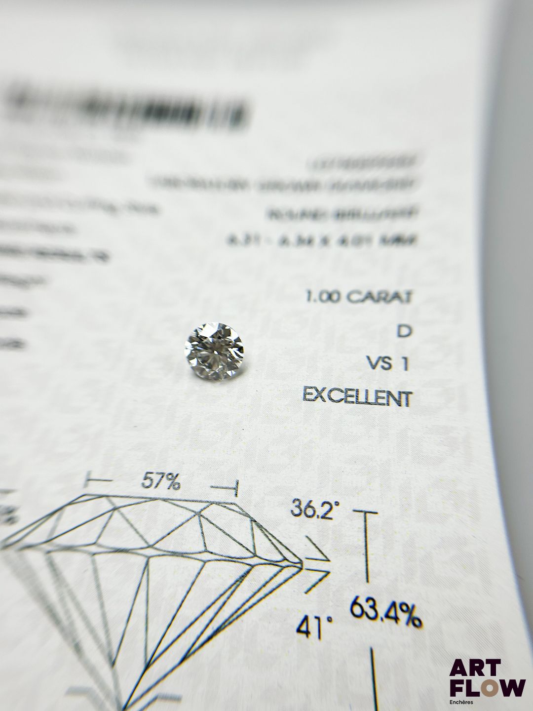 Diamant de synthèse de 1 carats de forme ronde, avec certificat précisant : D, VS1