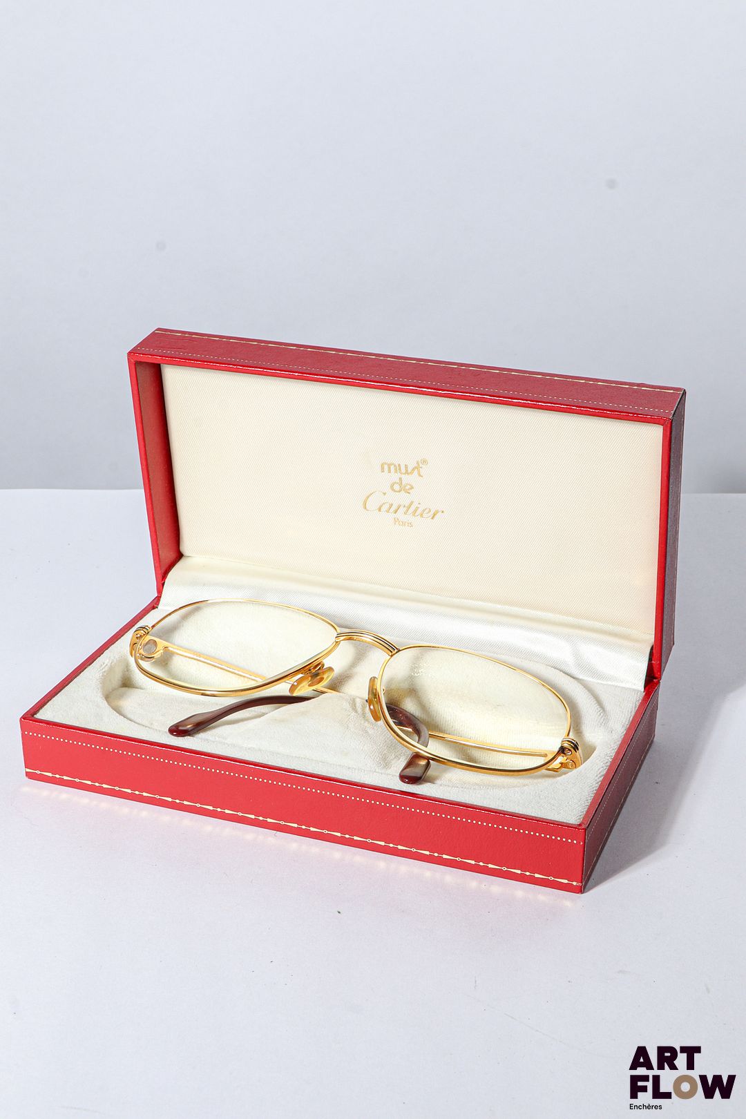 MUST DE CARTIER Lunettes de vue, branches en métal doré Dans son écrin d'origine