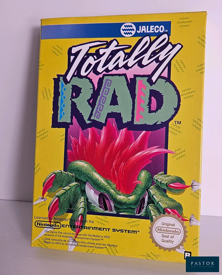 NINTENDO - NES. Jeu : Totally Rad. Complet avec boite, notice, cale et cartouche. Version FRA. TBE. Etat proche du neuf. Sortie : 1990. Action/ Plateforme 2D