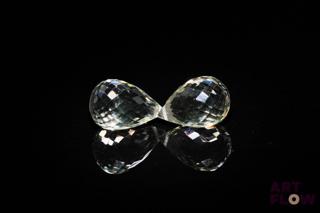 Appairage d'améthystes vertes (prasiolite) briolettes. 9.70 cts. Dims. moy.: 12.0mm x 8.0mm