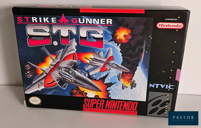 NINTENDO - SUPER NES. Jeu : STG Strike Gunner. Complet avec boite, notice et cartouche. Version US. TBE. Sortie : 1991. Shoot'em up