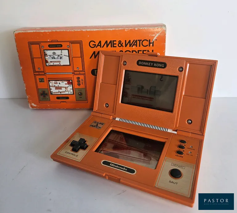 NINTENDO - GAME AND WATCH - Donkey Kong DK-52. Complet avec boite, notice, cale. Sortie : 1982