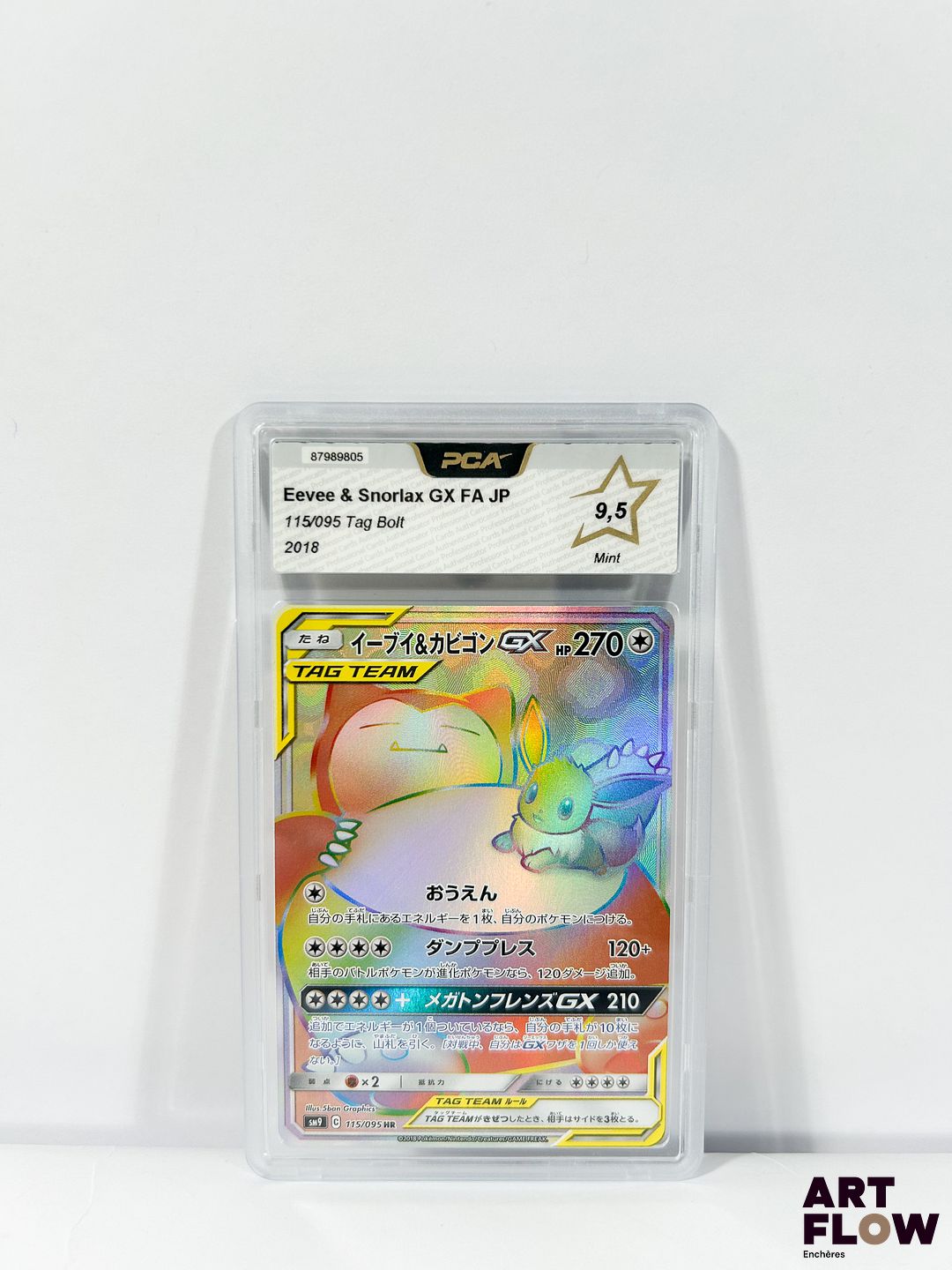 Carte Pokémon gradée Eevee & Snorlax (Évoli & Ronflex) GX 115/095 - Secrète Rainbow - PCA 9,5. Série Soleil&Lune : Tag Bolt (SM9). Carte en état Neuf (PCA 9,5), en japonais.