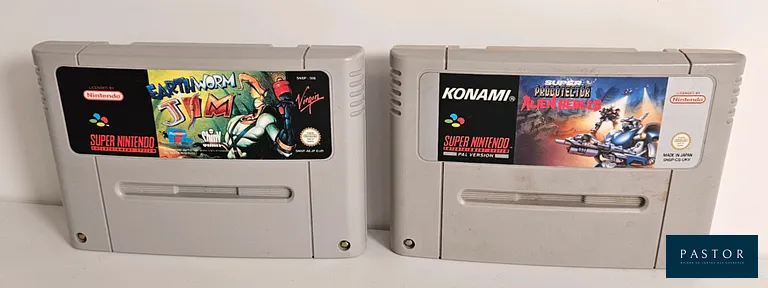 NINTENDO - SUPER NES. Lot de 2 jeux en loose : Super Probotector (UKV) et Earthworm Jim (EUR)