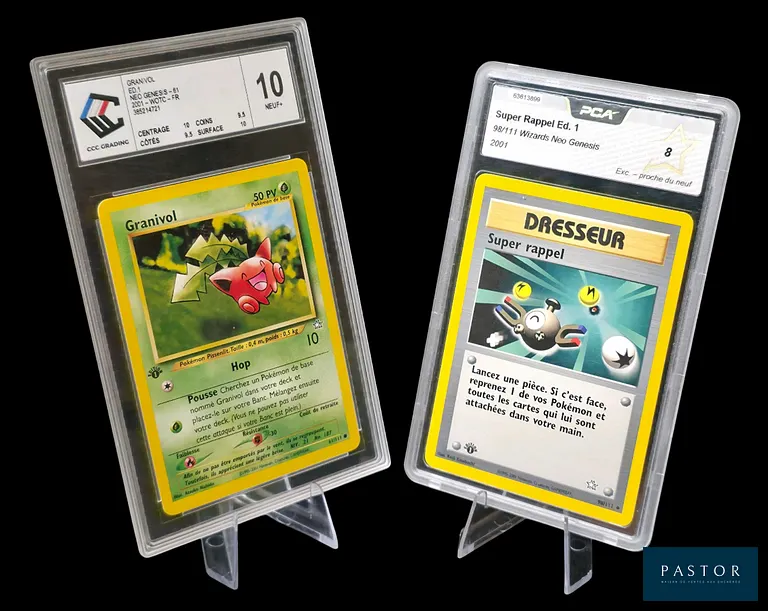 Réunion de 2 cartes Pokémon gradées de la série du bloc Wizards : Néo Genesis Édition 1.
- Granivol 61/111 - Commune - État Neuf+ (CCC Grading 10) 
- Super Rappel 98/111 - Peu Commune -  État Proche du Neuf (PCA 8)
En français.
