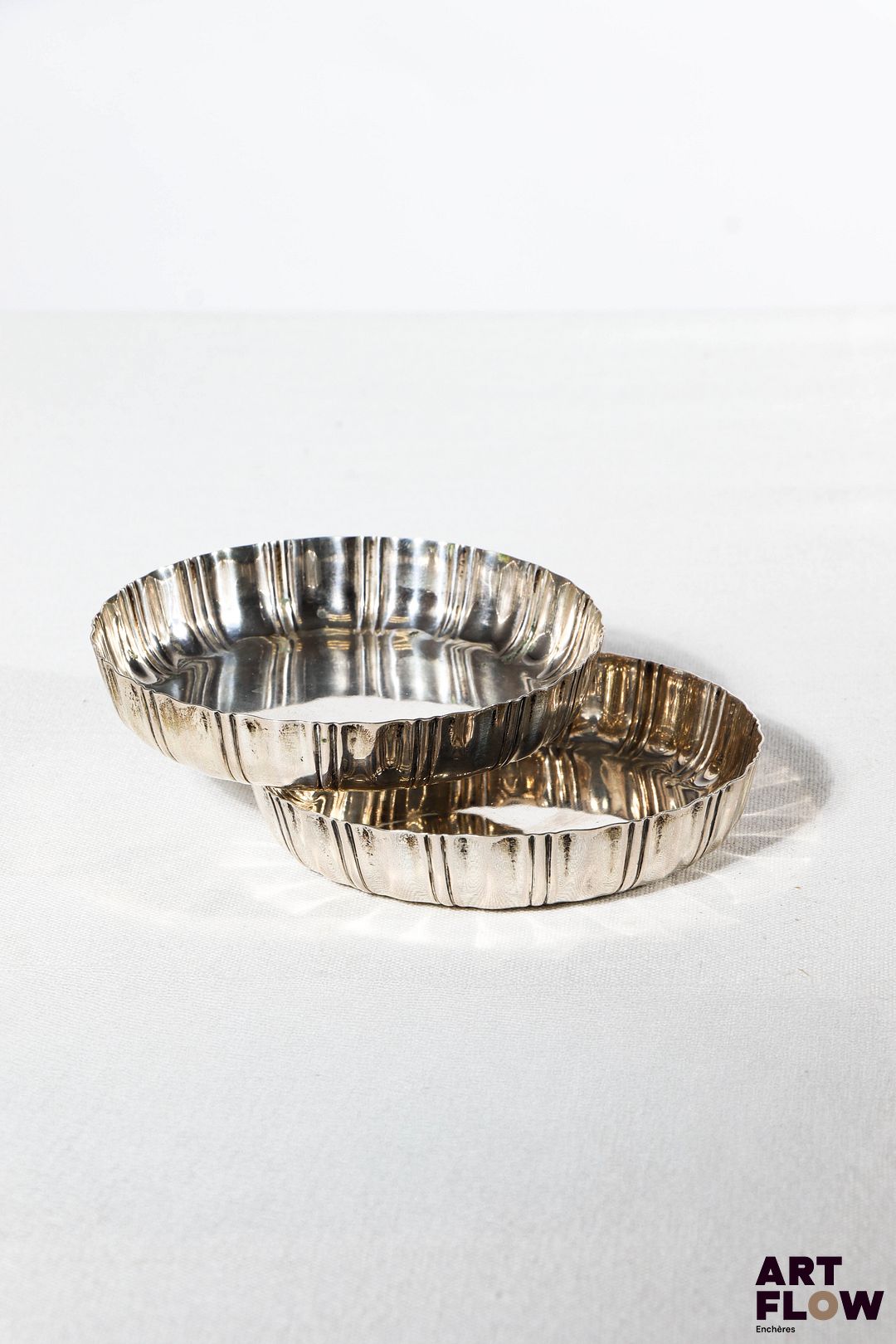 Deux petits moules à tarte circulaires en argent. Poids brut : 110 g Diamètre : 9 cm environ