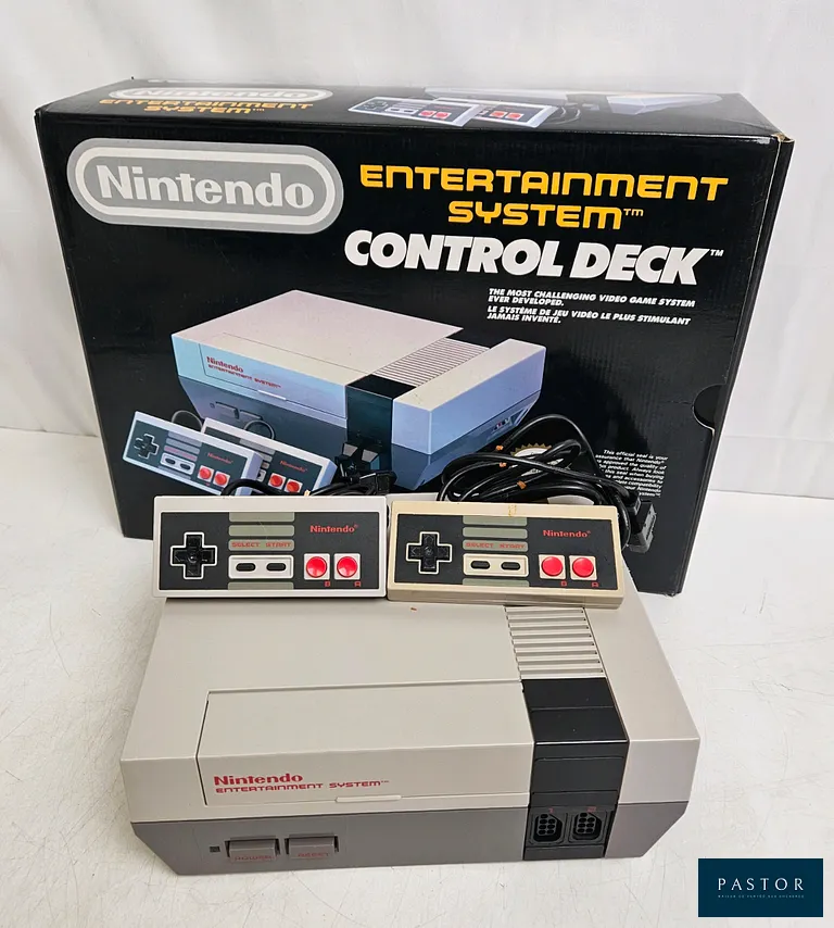 NINTENDO - NES. Console Nes en boite avec 2 manettes officielles, alimentation et péritel. BE. Sortie : 1987. PAL FRA. Model NESE-001. Culte - Test d'allumage effectué avec succès