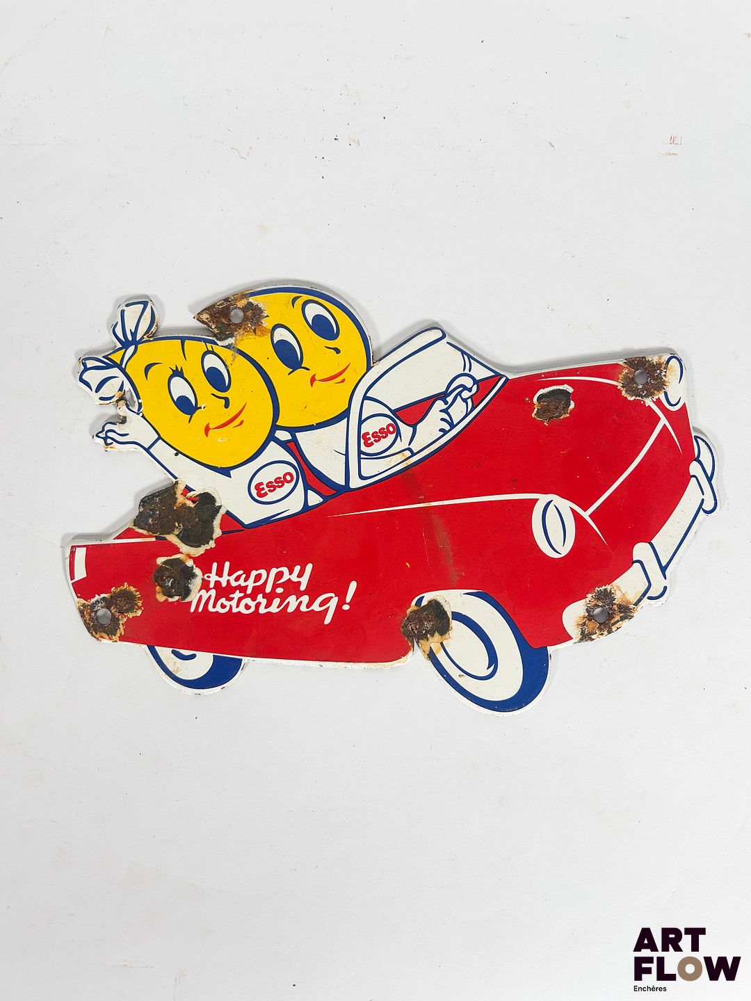 Plaque émaillée Esso Happy Motoring Dimensions : 16 x 24 cm Petits éclats et traces de rouille Reproduction moderne