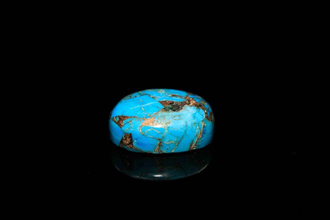 Turquoise «oyster» cabochon ovale. Traité. 6.99 cts. 14.0mm x 10.0mm