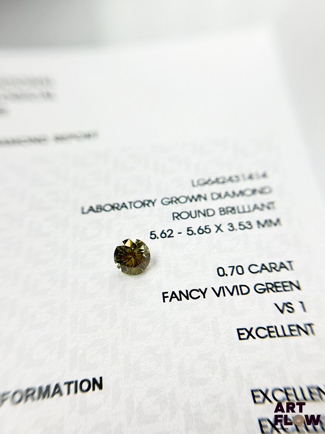 Diamant de synthèse de 0,7 carats de forme ronde, avec certificat précisant : FANCY, VS1