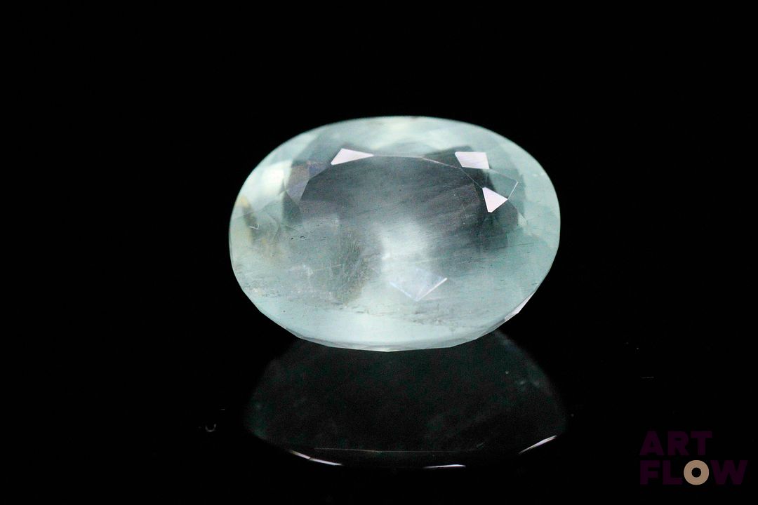 Importante aigue-marine ovale. Jolie couleur, inclusions. 12.06 cts. 16.8mm x 13.9mm