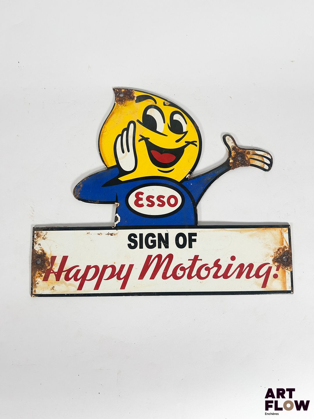 Plaque émaillée Esso Happy Motoring Dimensions : 24,5 x 30 cm Petits éclats et traces de rouille Reproduction moderne