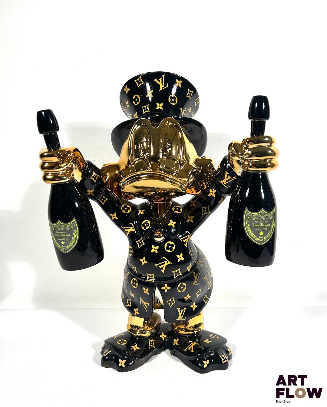 The Nineties "LV Picsou is ready for Champagne" Sculpture Pop Art en résine chromée. Edition limitée, numérotée 2/2, signée, avec certificat d’authenticité. Dimensions : 43 x 29 cm