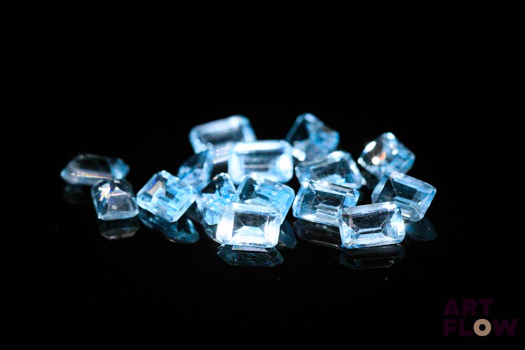 Quinze topazes rectangulaires à pans coupés. 11.55 cts. Dims. moy.: 6.0mm x 4.0mm