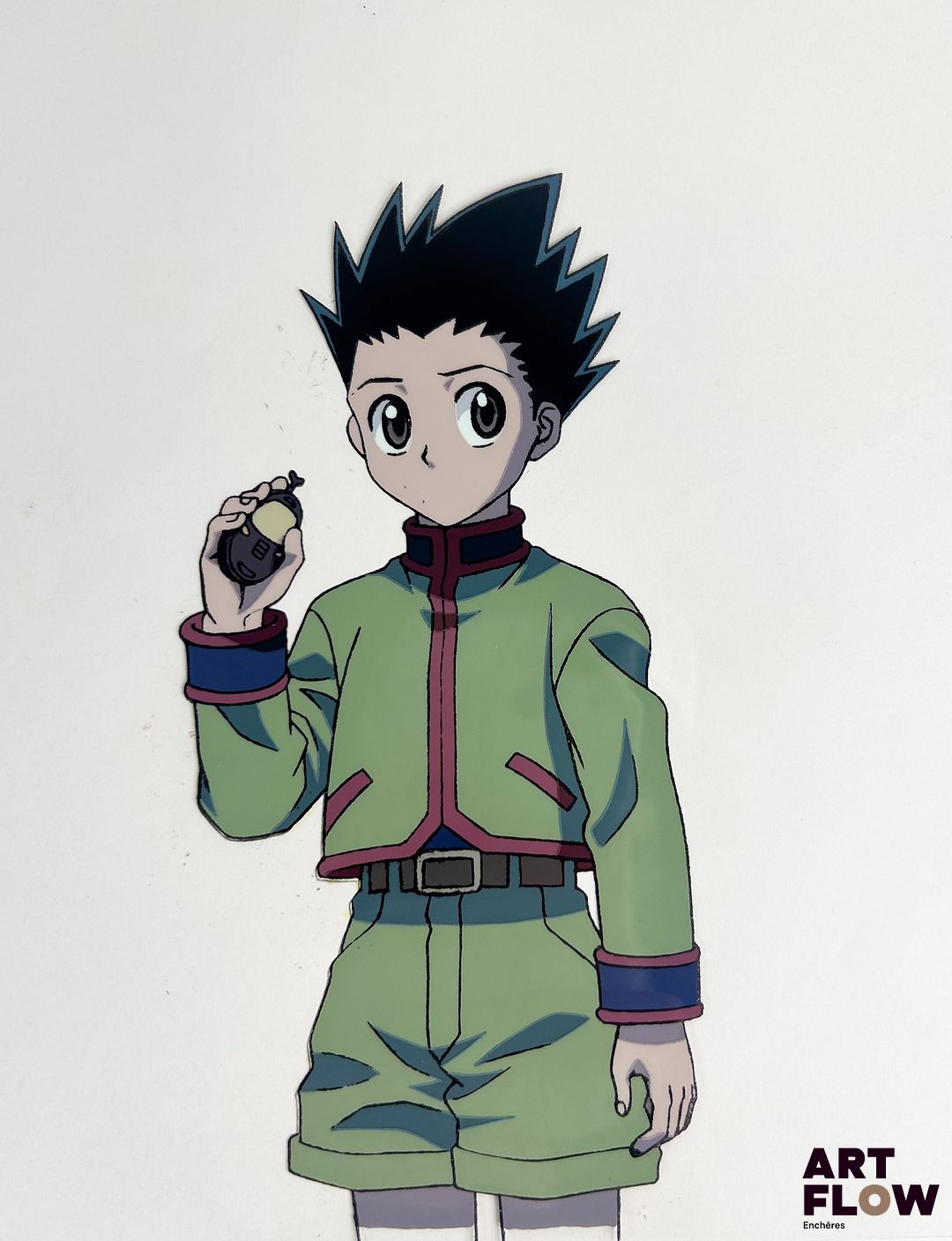 Hunter x Hunter Gon Freecss Cellulo à l’encre et à la gouache représentant Gon Freecss tenant un téléphone Anime / manga japonais créé par Yoshihiro Togashi "Gon Freecss est un jeune garçon courageux et optimiste, déterminé à devenir Hunter pour retrouver son père. Curieux et persévérant, il incarne l’aventure, l’amitié et la détermination." Dimensions : 24 x 27 cm
