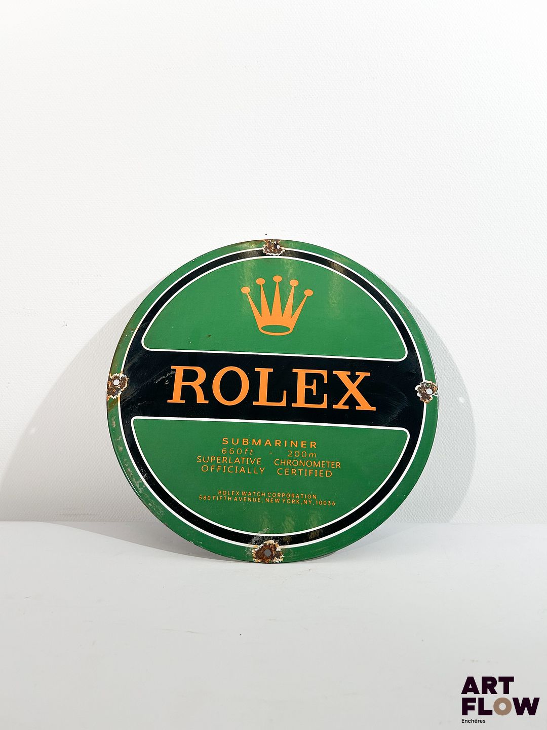 Plaque émaillée ronde d'après Rolex Diamètre : 30 cm Petits éclats et traces de rouille - moderne