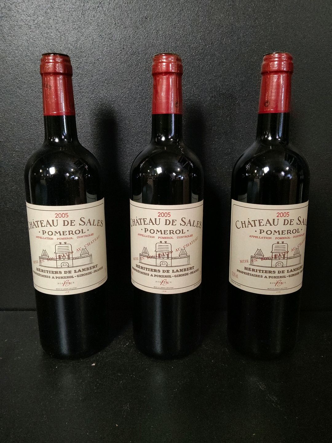3 bouteilles de vin rouge du Château de Sales Pomerol 2005