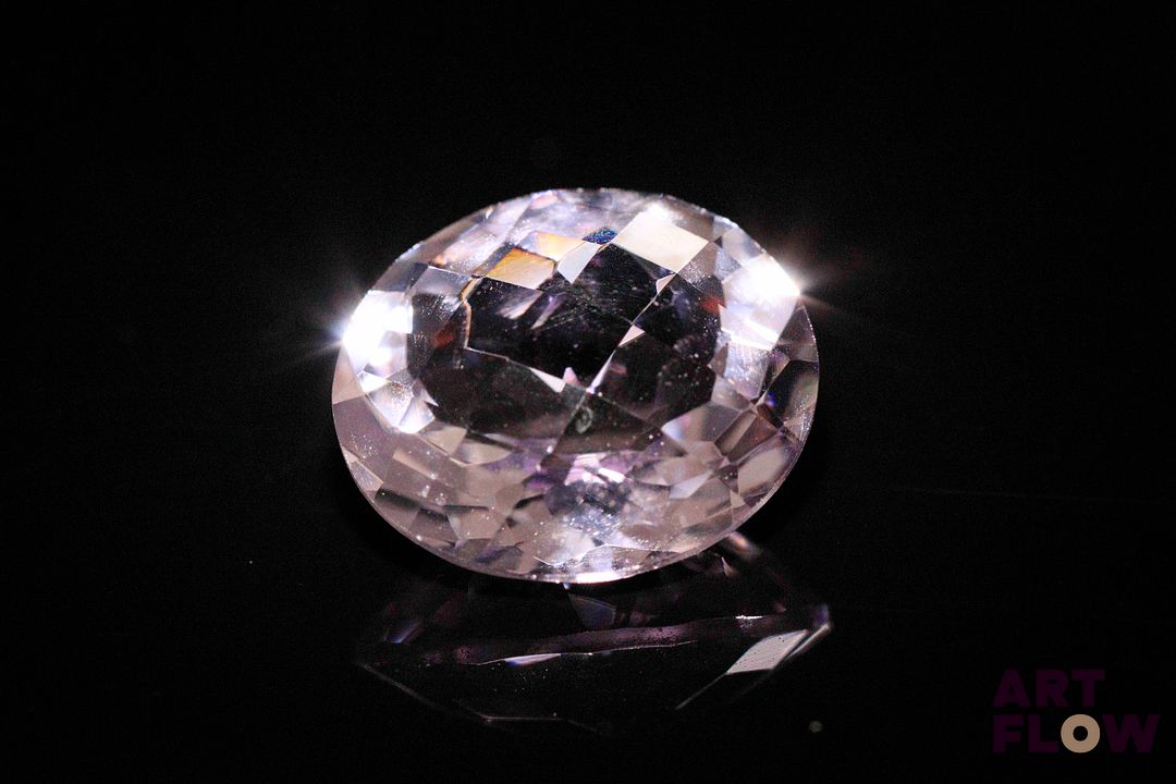 Améthyste ovale fantaisie. Jolie couleur. 10.55 cts. 16.0mm x 14.0mm